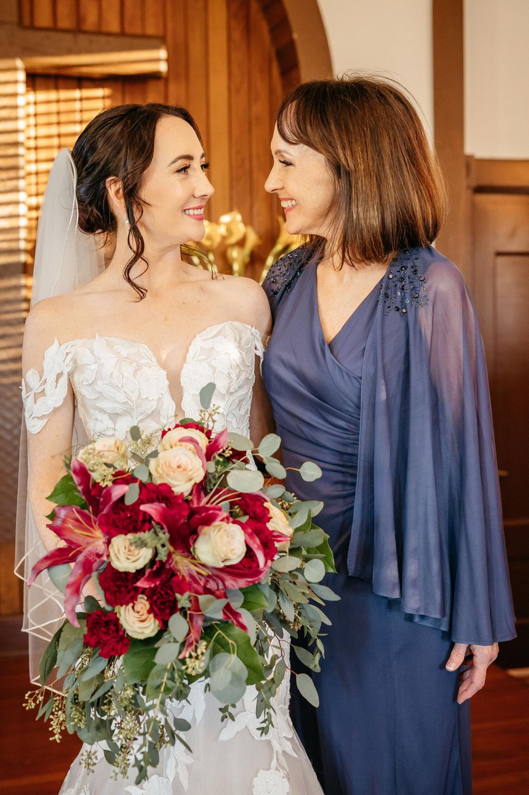 Bride with styled updo and her mother