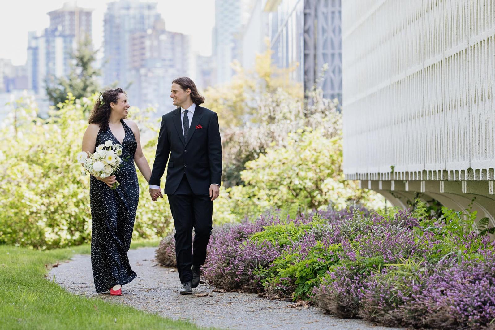 Garden engagement couple stroll