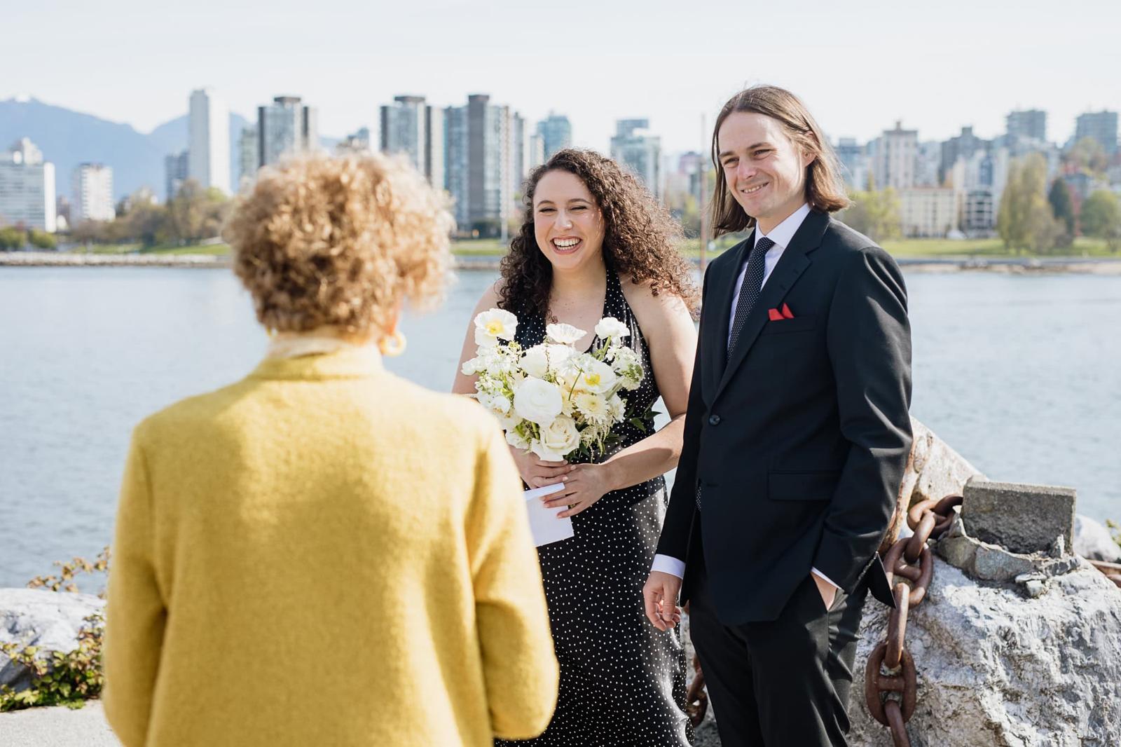 Waterfront elopement ceremony moment