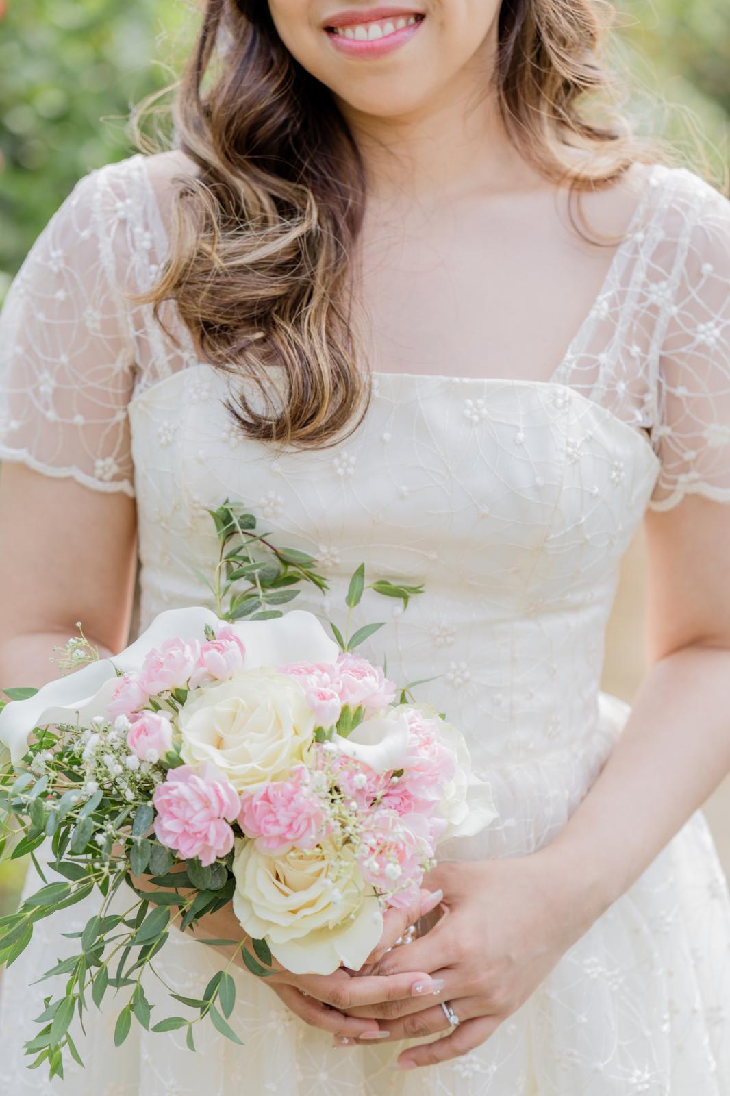 Bride in lace gown with bouquet