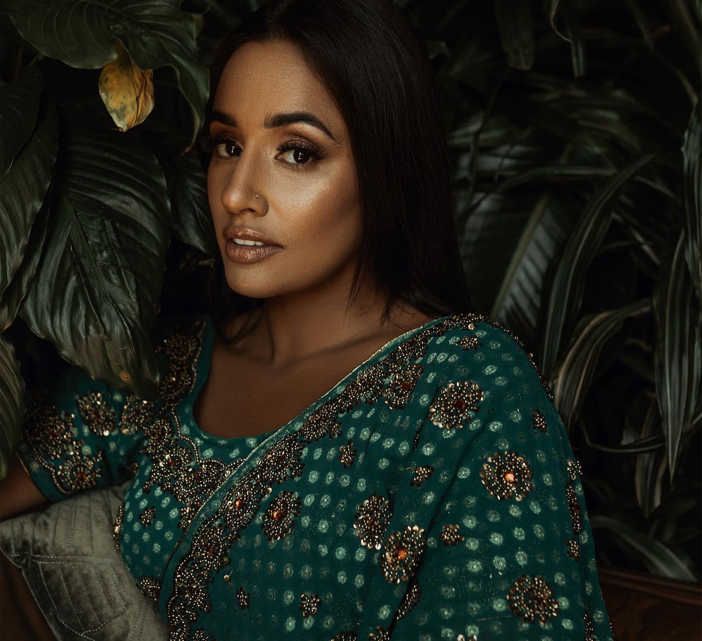 South Asian highlighted glam in green sari